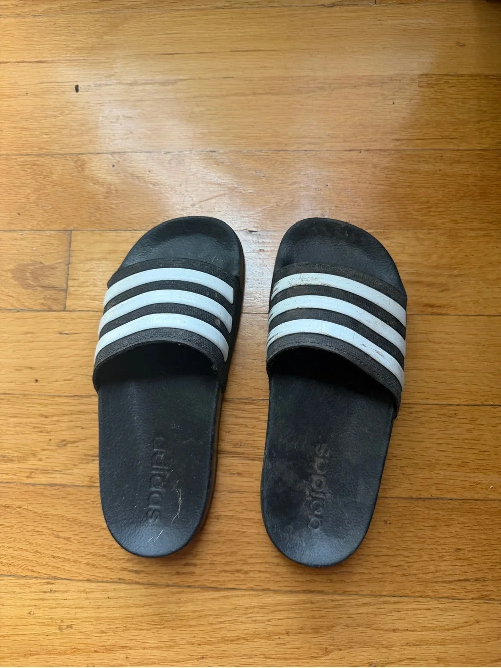 Kids adidas Black Slides with White Stripes